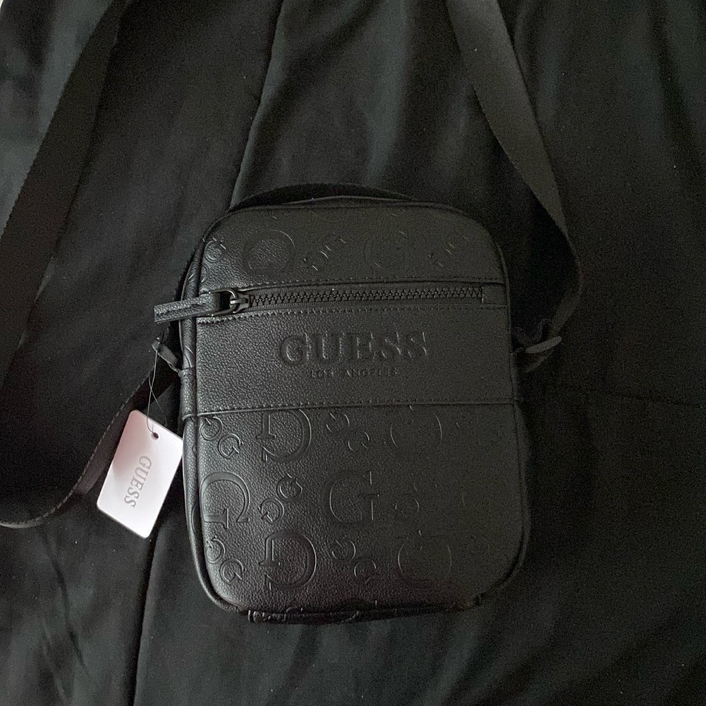 Black Guess Brand New tissue inside never used unisex cross body bag